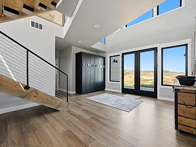 Entry foyer with cable-rail staircase